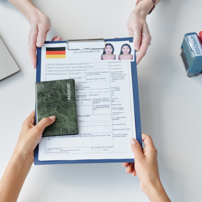 Person filling out a visa application form for Germany.